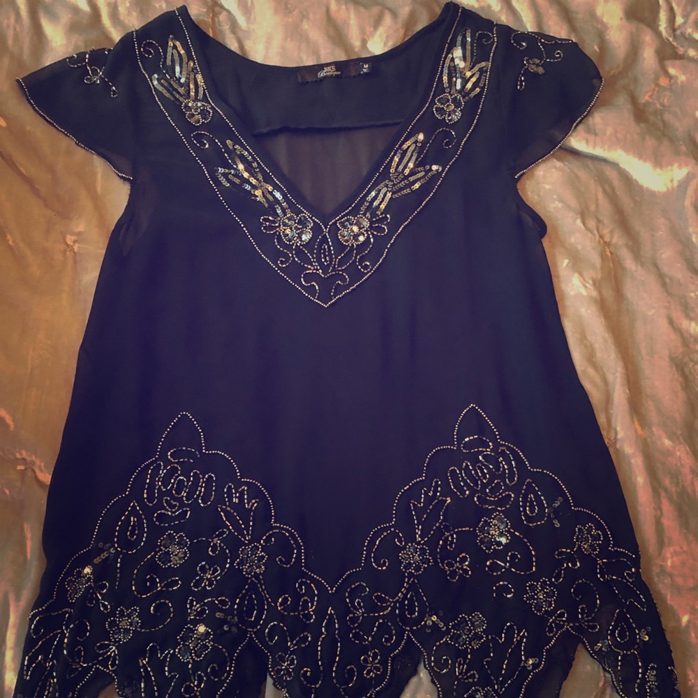 Sheer back Buckle Boutique top